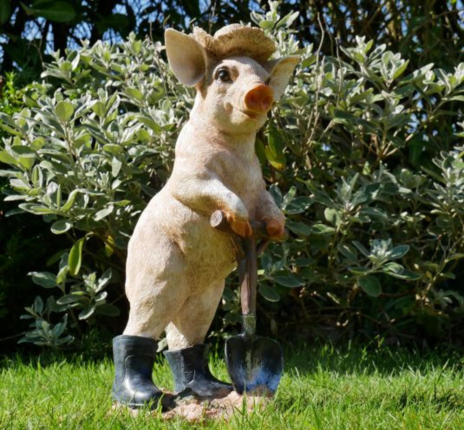 Pig in boots with spade