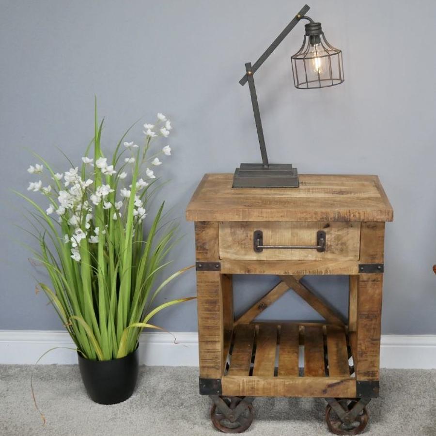 Industrial style side table with iron wheels