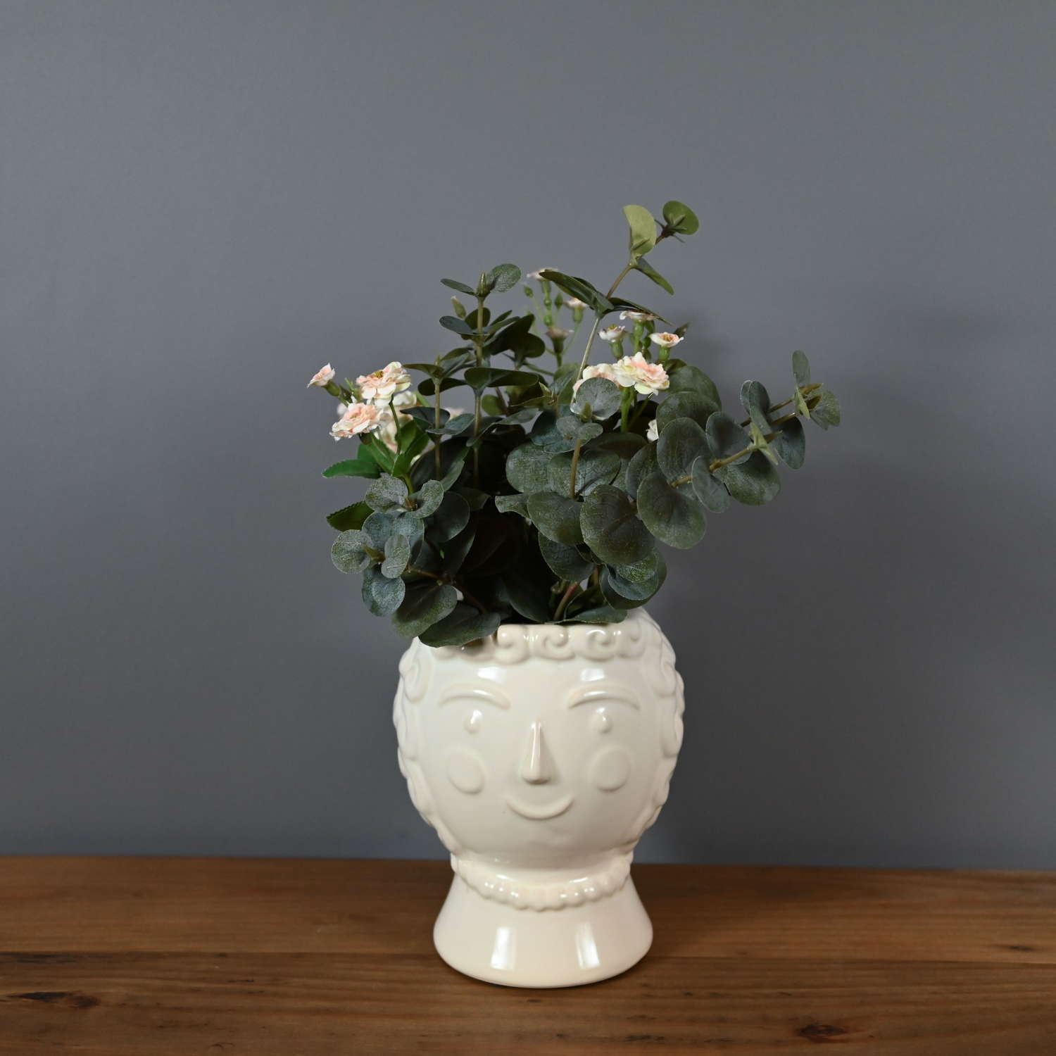 Lady Julius cream ceramic face vase planter