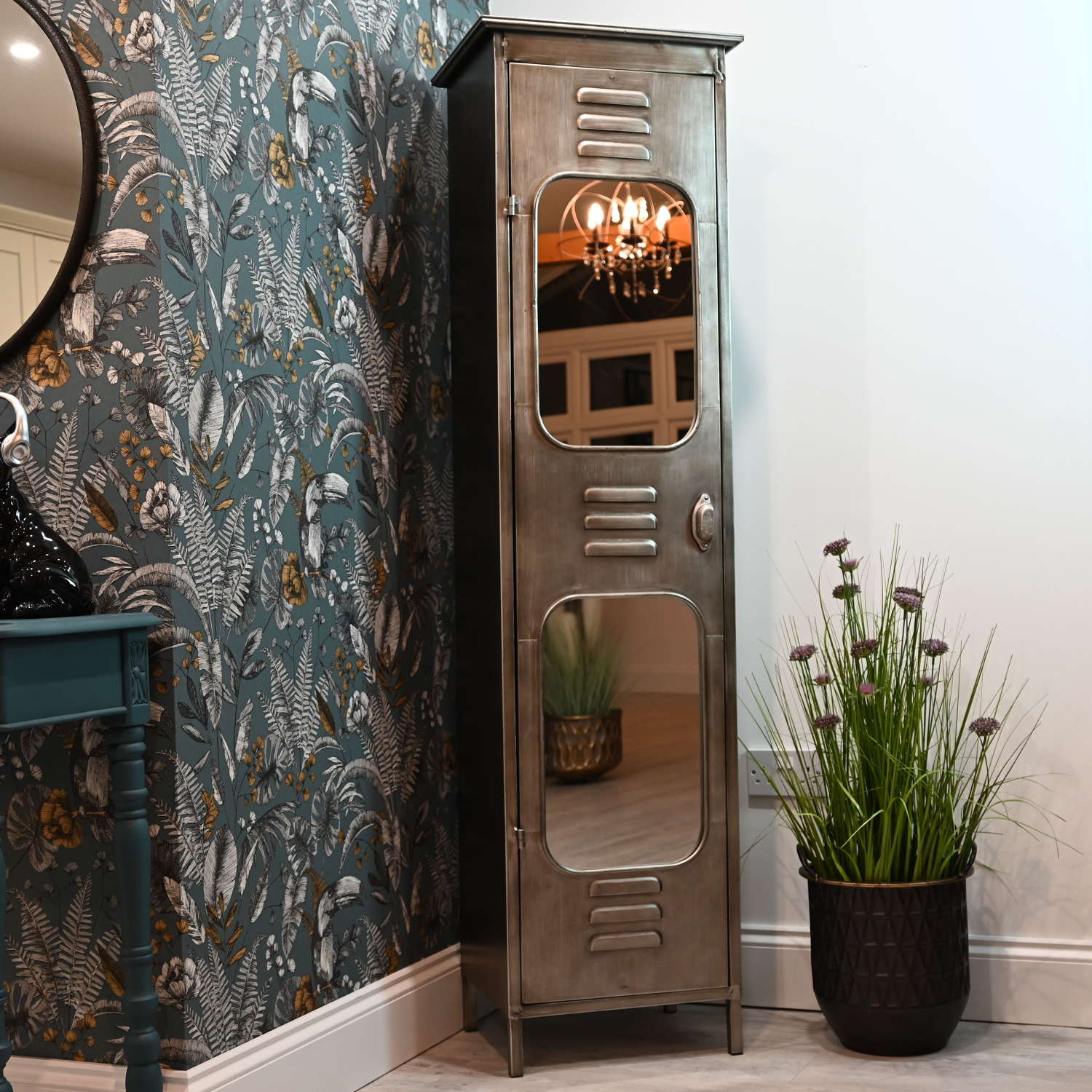 Tall metal locker style cabinet with mirrors