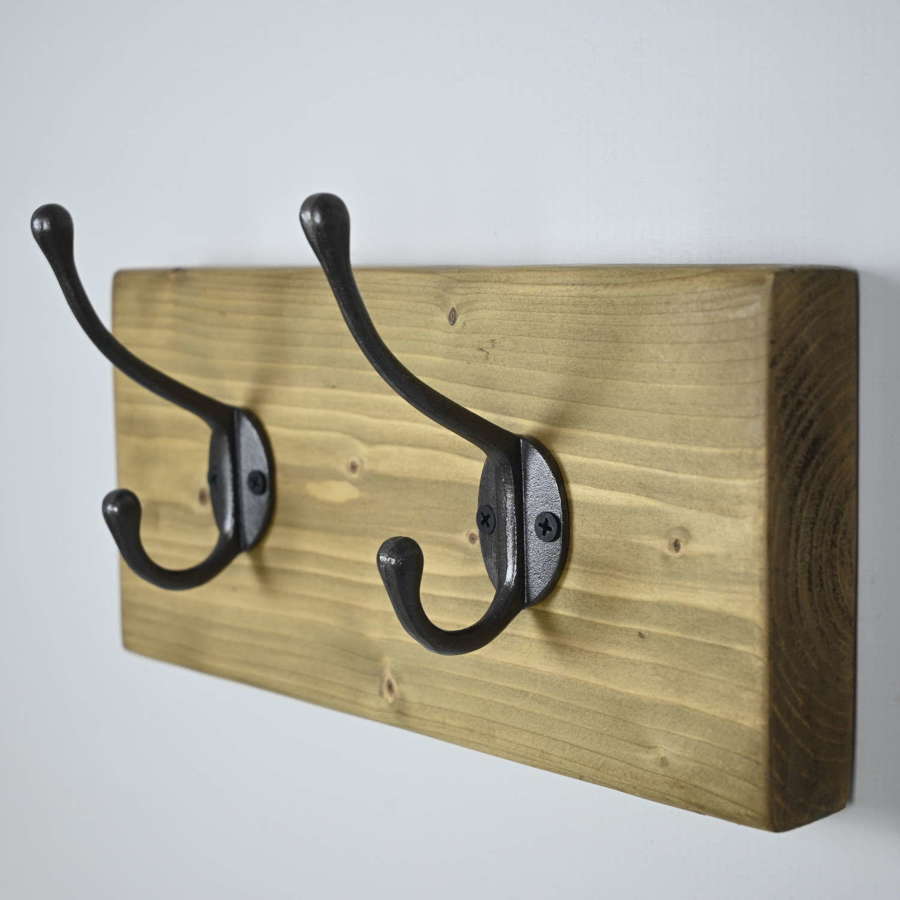 Rustic wall hanging coat rack with two cast Iron hooks