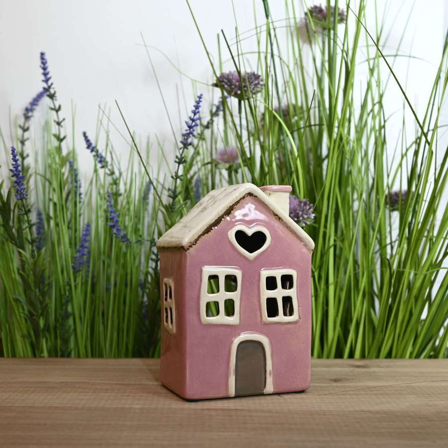 Pottery Village pink house tealight holder